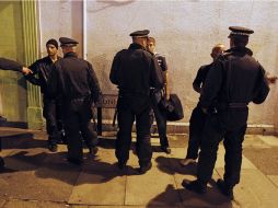 El Gobierno británico anunció una reforma de los salarios de la policía que supondrá la rebaja de más de un 17 % en el sueldo. ARCHIVO /