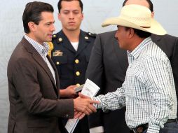 Peña Nieto encabezó la entrega de apoyos del Programa de Ordenamiento de la Propiedad Rural. SUN /