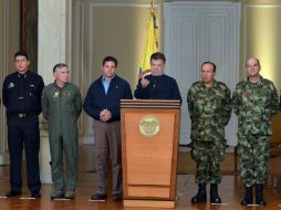 Juan Manuel Santos da una conferencia de prensa tras el alto al fuego por parte de FARC AFP /