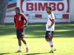 Marco Fabián y Miguel Sabah durante el entrenamiento de Chivas. MEXSPORT /