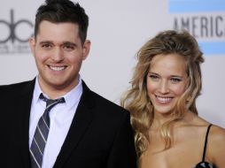 El primogénito de la pareja nacería a mediados de este año. AP /