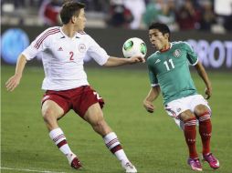 Aquino (der) es uno más de los mexicanos que militarán en Europa. REUTERS /