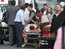 Aspecto de la zona donde se realiza el rescate de personas atrapadas. EFE /