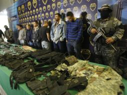 En el operativo de la Secretaría de Seguridad Publica de Jalisco se aseguraron armas, equipo táctico y vehículos. EL INFORMADOR /