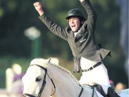 Alegría. Juan Pablo Gaspar levanta los brazos en señal de triunfo tras percatarse que logró el título mundial. ESPECIAL /