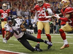 Jacoby Jones anota en la parte final del segundo cuarto. AP /