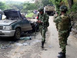 La Policía Nacional de Colombia está en alerta máxima en todo el país para prevenir ataques de las FARC. AP /