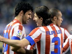 El equipo de la capital española llega con dos goles de desventaja. EFE /