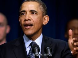 Obama recordó que la extensión que decretó en 2004, igual que la presente, tuvo como propósito negar a Cuba apoyo monetario y material. AP /