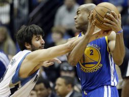 Rubio (izq) y su doble-doble no son suficientes para vencer a Minnesota. AP /