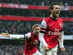 Los 'Gunners' están a punto de ser eliminados de la Champions League y muy lejos de la Liga inglesa. AFP /