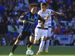 Acción del partido entre el Querétaro y el Monterrey de la Jornada 9 del torneo. MEXSPORT /