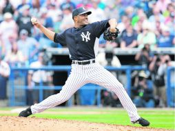 Apenas horas después de anunciar su adiós, Mariano Rivera retiró a sus tres oponentes, en duelo de pretemporada ante los Bravos. AP /