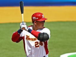 Tres carreras y un jonrón del ganador de la 'Triple Corona' despiden con triunfo a Venezuela. AFP /