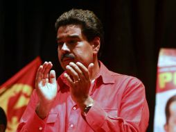 El actual candidato Nicolás Maduro llamó a los venezolanos a mantener la paz. AFP /