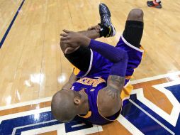 Bryant dejó el juego a 2.6 segundos antes de que concluyera. AP /