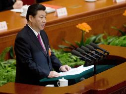Jinping  prometió reducir los beneficios y dádivas del gobierno y la burocracia oficial. AP /