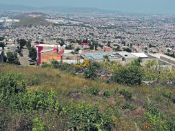 En las faldas del volcán apagado. Mil 300 es el total de viviendas asentadas de forma regular en el Cerro del Cuatro. EL INFORMADOR /