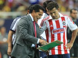 El técnico rojiblanco (i) confía en que Michel y Sabah (d) se recuperen para enfrentar a Jaguares el próximo viernes. ARCHIVO /
