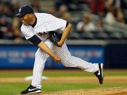 El pitcher durante el juego. AFP /