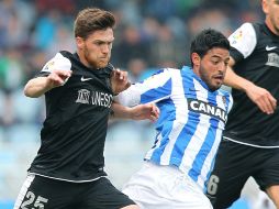 El de Cancún (d) es un jugador muy importante para la Real. EFE /