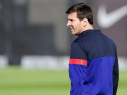 Lionel Messi entrena con el resto del equipo de cara al partido de cuartos de final de la Champions League. AFP /