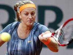 Petra Kvitova devuelve una bola a la luxemburguesa Mandy Minella, durante el partido de segunda ronda. AFP /