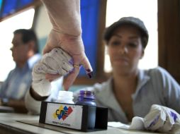 Los venezolanos votaron para elegir al nuevo mandatario que estará en el poder hasta 2019. AP /