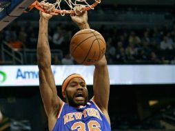 El veterano jugador consiguió unos promedios de 14.4 puntos y 6.7 rebotes por partido como profesional. AP /