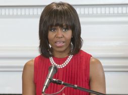 La primera dama  destaca el valor de los voluntarios, policías y bomberos luego del atentado en Boston. AFP /