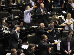 Diputados de la oposición señala que se vulnera la independencia de la justicia y garantiza la impunidad. AFP /