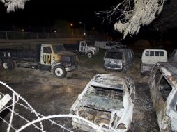 La imagen muestra los daños sufridos a vehículos de la Organización de las Naciones Unidas. AFP /