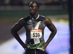 El plusmarquista mundial de 100 y 200 metros, no correrá el 4 de mayo ARCHIVO /