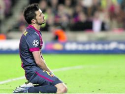 Vergonzoso. David Villa luce en el césped, impotente tras el baile que les puso el ''ciclón'' llamado Bayern. AFP /
