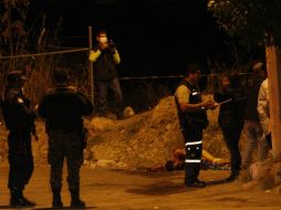 Elementos de la Policía de Guadalajara informaron que el menor de edad fue asesinado con un revólver. ARCHIVO /