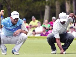Tensa relación. Sergio García y Tiger Woods hablaron poco tras el incidente en el hoyo dos. EFE /