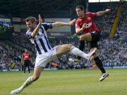 Javier dice adiós a su técnico llegando al medio centenar de goles. AFP /