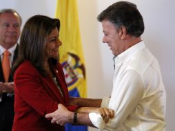Los jefes de Estado Laura Chinchilla, de Costa Rica, y Juan Manuel Santos, de Colombia. AP /