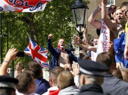 Portaron pancartas con lemas como ''Sangre en vuestras manos'' y ''Reino Unido RIP''. AP /