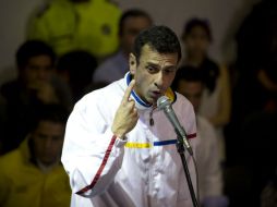 ''Asistir a un acto protocolario, tomarse una foto, eso no da legitimidad'', manifestó el ex candidato presidencial. AFP /