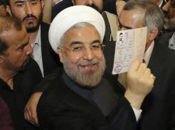 Rohani se impuso en las elecciones con 50.68% de los votos. EFE /
