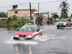 Una calle inundada en Veracruz, la tormenta ''Barry'' causa el desbordamiento de ríos. EFE /