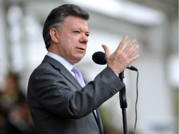 El presidente colombiano tiene previsto entregar los títulos de propiedad de la tierra a 46 familias de la región. AFP /