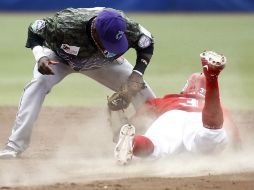 Luis Terrero y Eliezer Alfonzo contribuyen con cuadrangulares a Diablos Rojos. NTX /