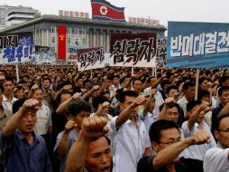 Ciudadanos norcoreanos realizan un desfile antiestadounidenses en el marco de la conmemoración. AP /