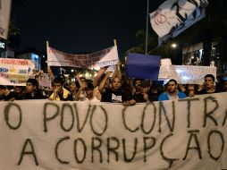 La ola de marcha en Brasil ha desmotrado el descontento popular hacia el gobierno. AFP /