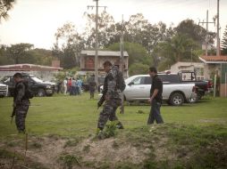 La policía estatal hizo un cerco en la zona donde realizaron la búsqueda de evidencias.  /