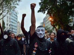Manifestantes se congregan en las inmediaciones del Maracaná durante la final de la Confederaciones. ARCHIVO /