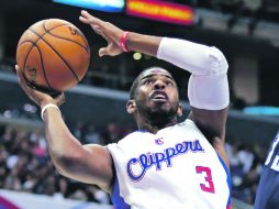 Chris Paul probó la agencia libre sólo unos minutos, antes de aceptar la oferta de su equipo y firmar una renovación. AP /