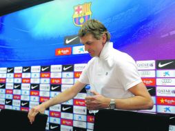 Tito Vilanova, técnico del cuadro catalán, asegura que nadie de la directiva culé ha aprovechado su enfermedad para atacar a Guardiola. AFP /